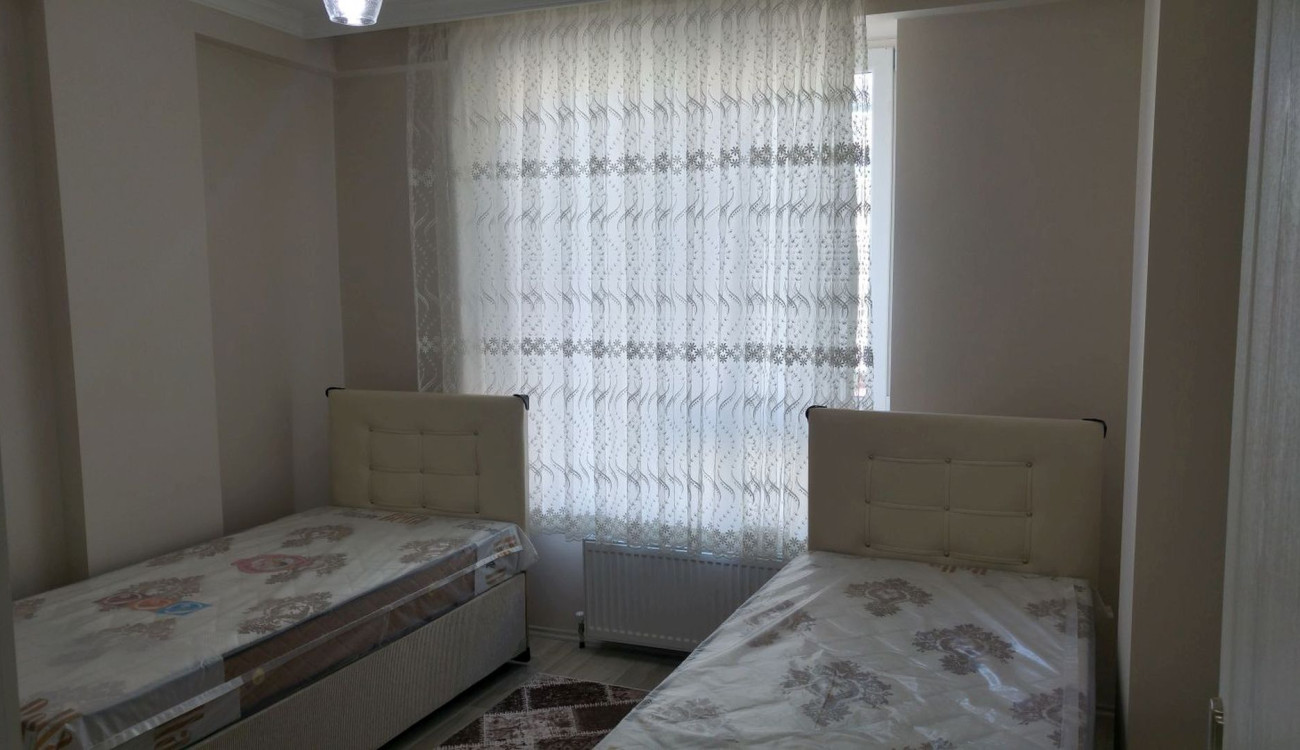 Evrenkaya Suit